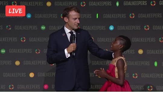 DJ Switch shares stage with French President Emmanuel Macron at 2018 Goalkeepers (Photos)